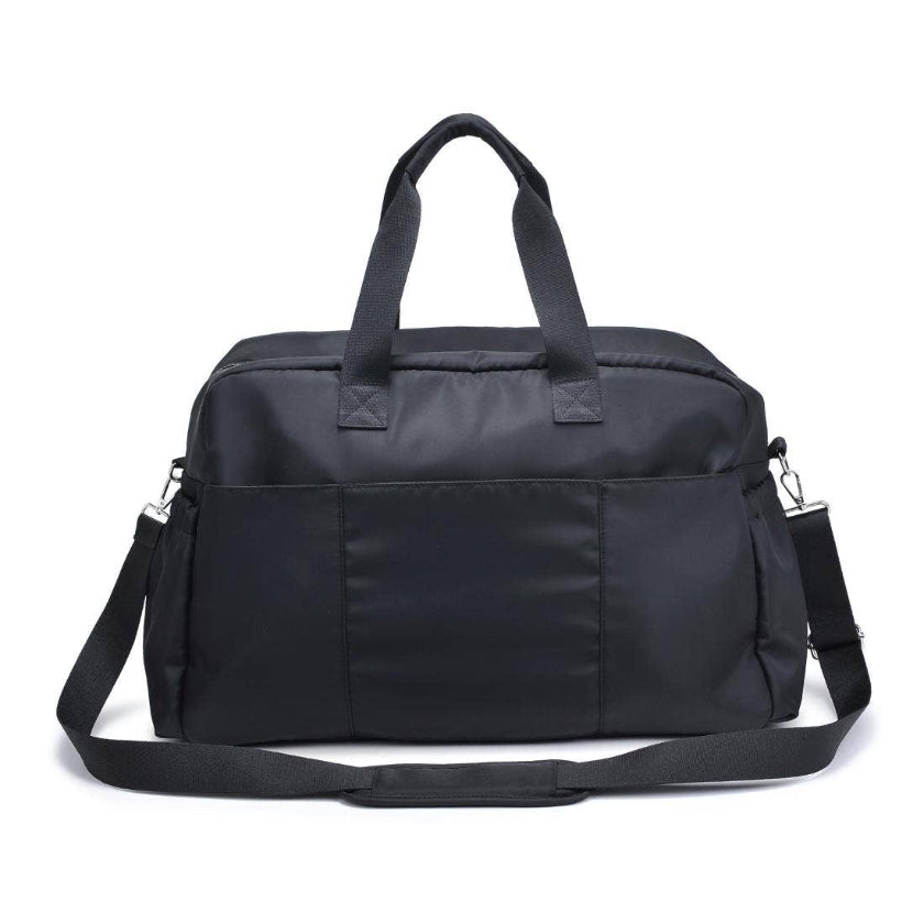 Black duffel bag with shoulder strap on a white background