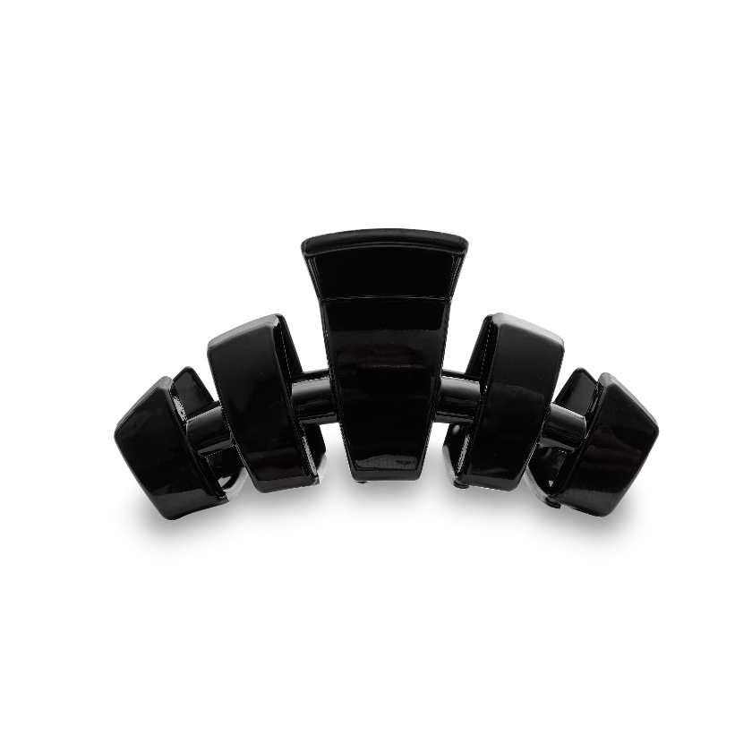 Black hair clip on a white background