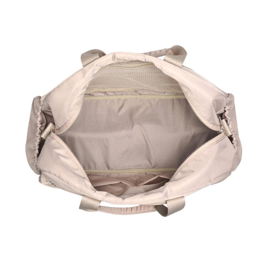 Beige backpack with open front compartment on a white background