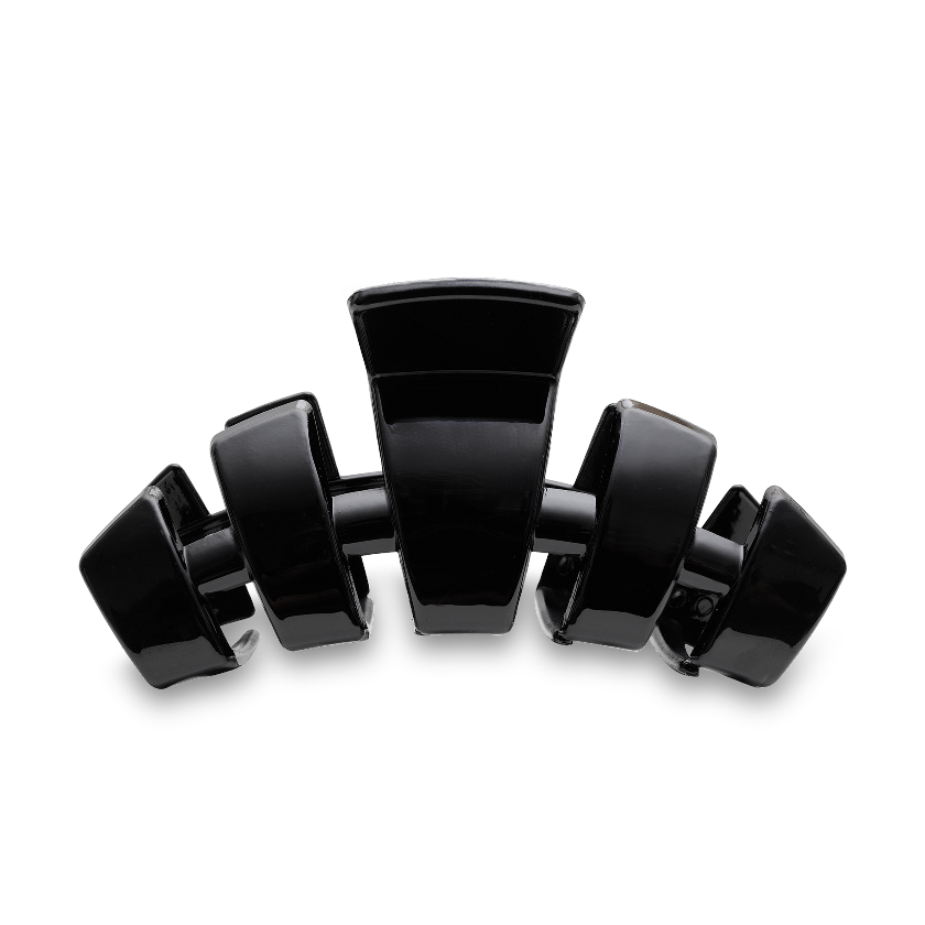 Black hair clip on a white background