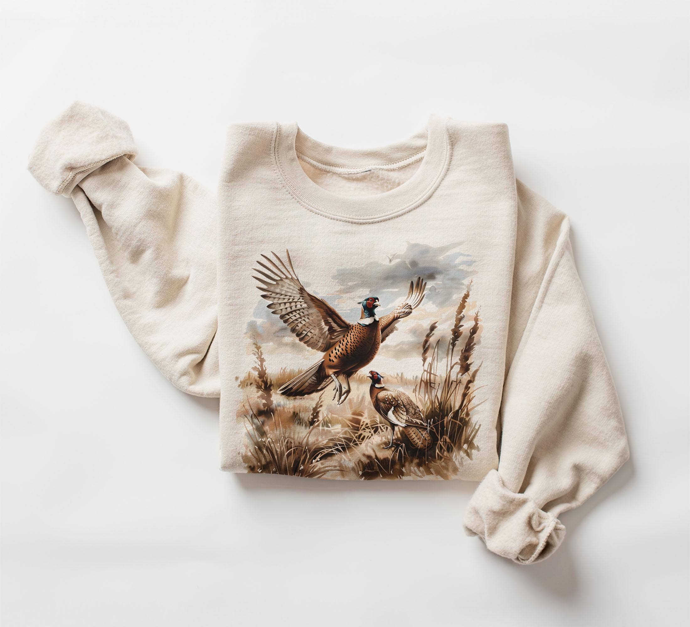 Beige sweatshirt with a bird design on a white background
