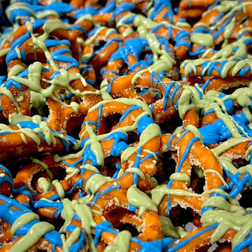 Assorted pretzels with colorful drizzle on a close-up shot