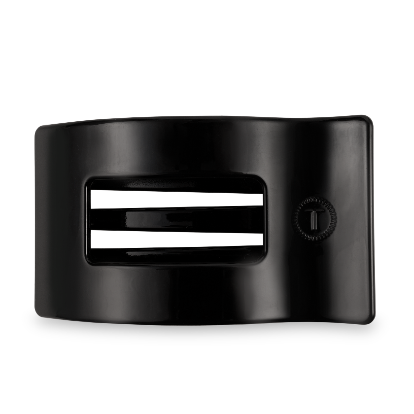 Black belt buckle with white stripes on a white background