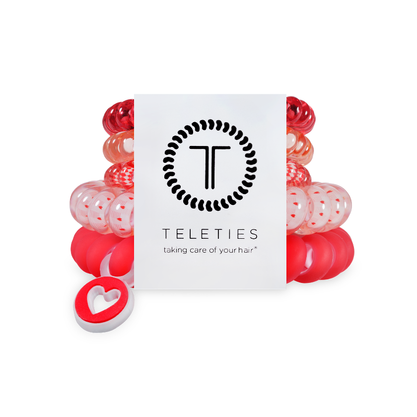 Red and white hair ties with 'Teleties' packaging on a white background