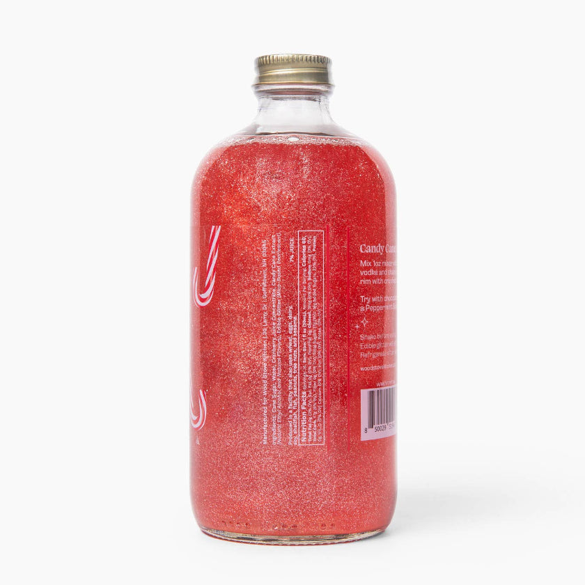 Red bottle with a silver cap on a white background