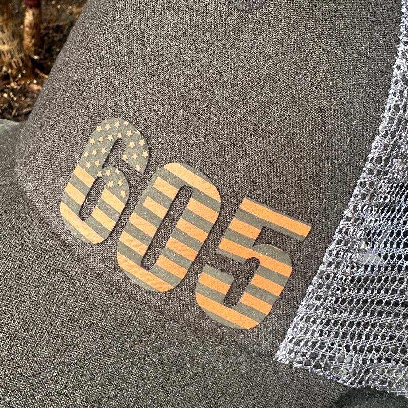 Black Patriot 605 - Unisex Trucker Hat