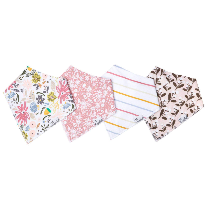 Set of four baby bibs with different patterns on a white background