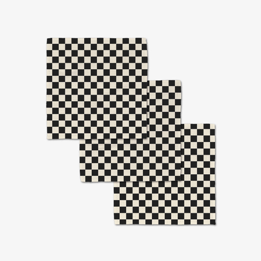 Two checkered rugs with black and white pattern on a white background