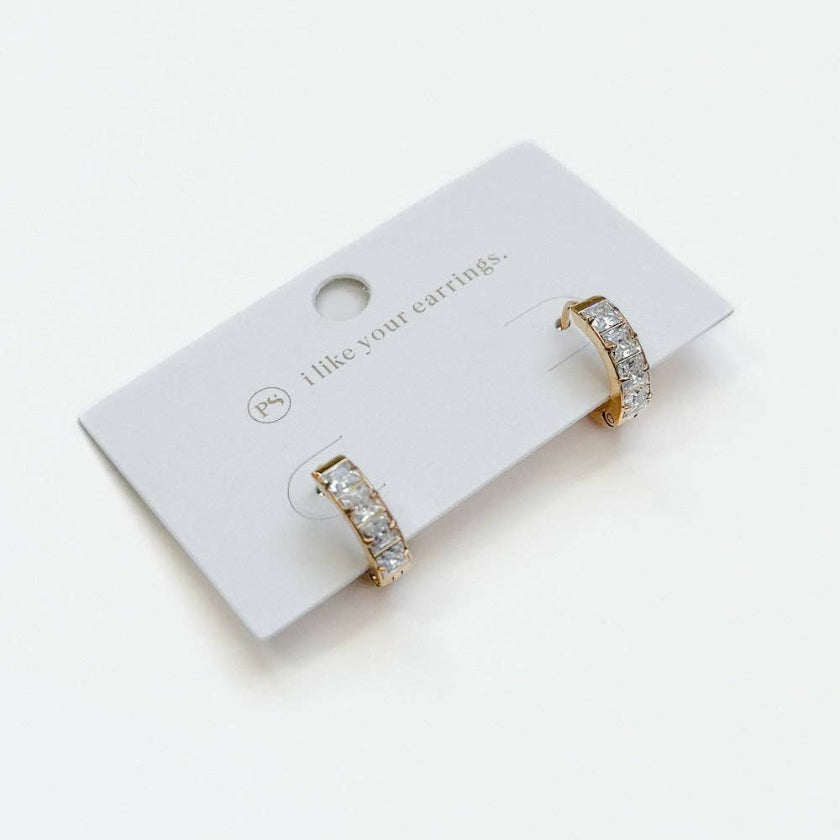 Gold hoop earrings on a white card with 'I like your earrings' text.