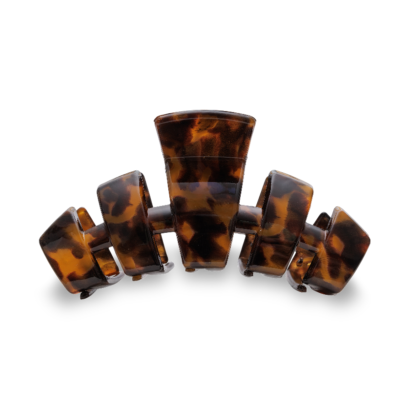 Tortoiseshell hair clip on a white background