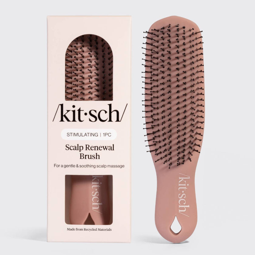 Kit-sch scalp renewal brush with packaging on a light gray background