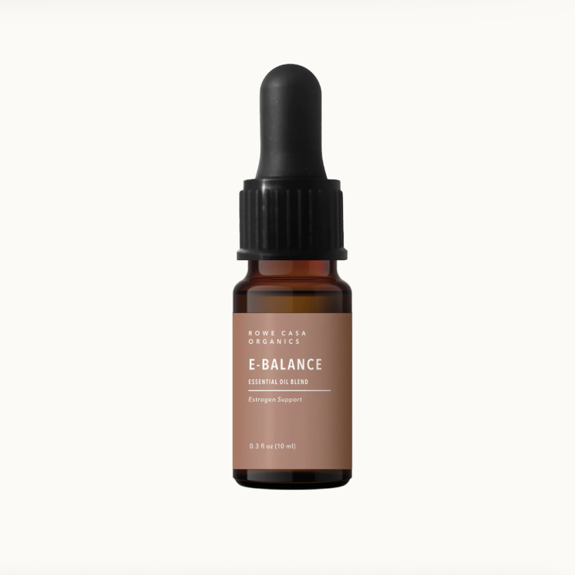 Bottle of Rome Casa Organics E-Balance essential oil blend on a white background