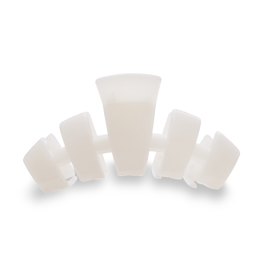 Set of white silicone cups on a white background