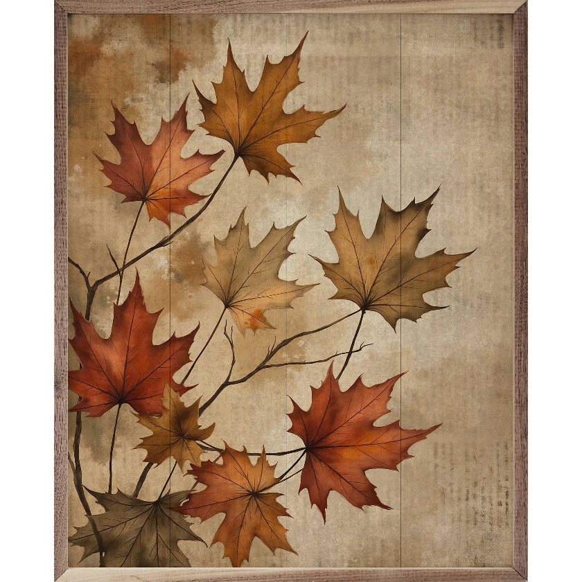 Framed artwork of autumn leaves on a textured beige background