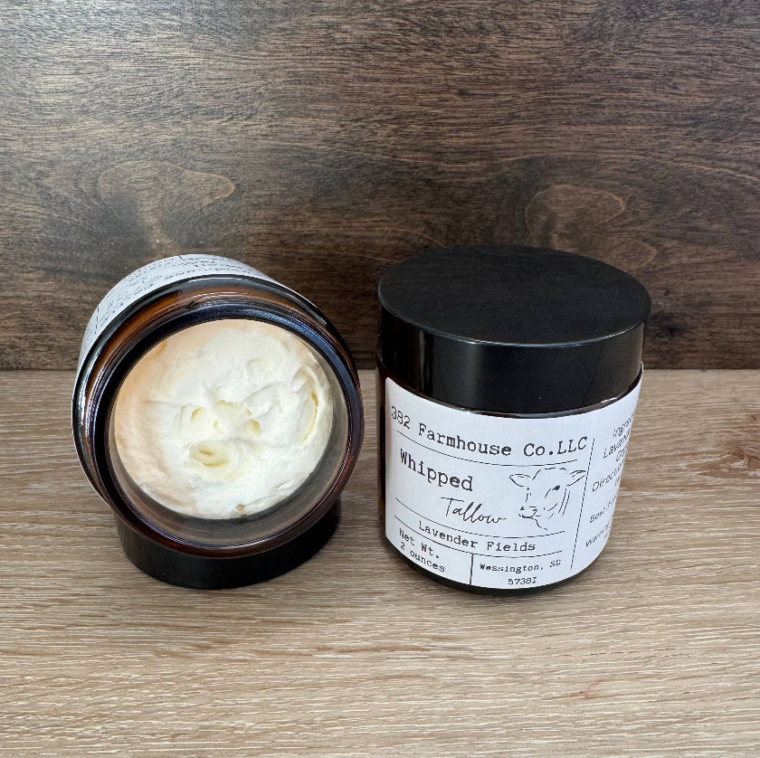 Two jars of whipped product from G&Z Farmhouse Co. LLC on a wooden surface with a wooden background.
