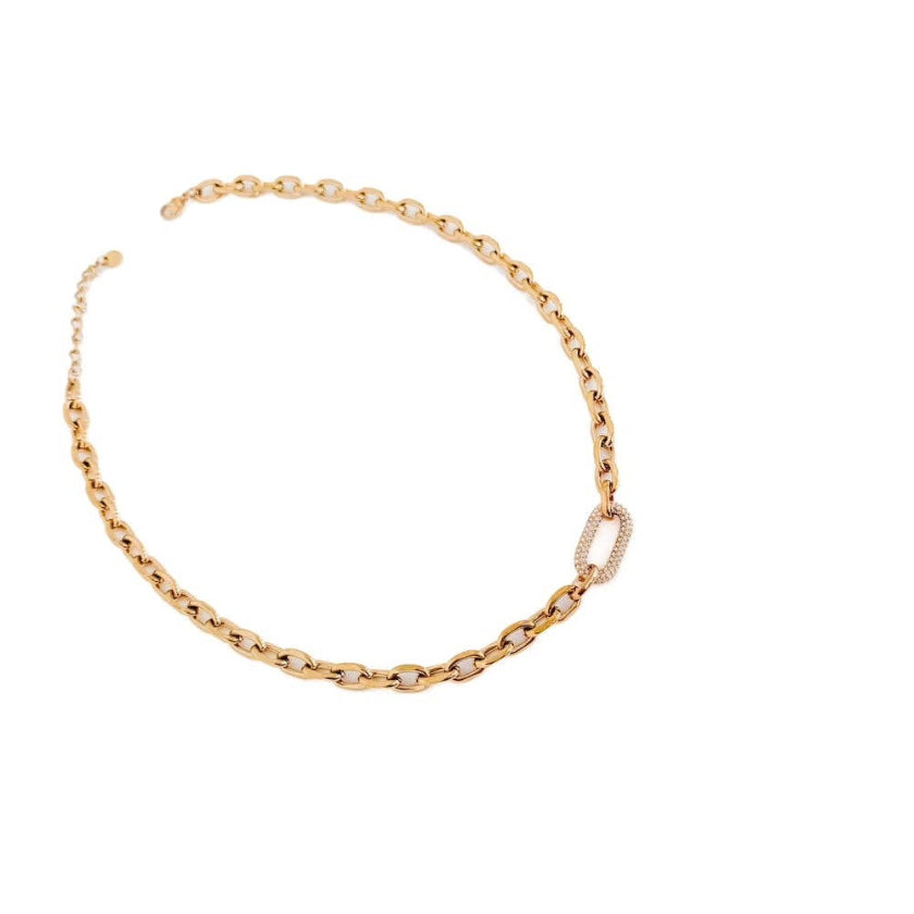 Gold chain necklace on a white background