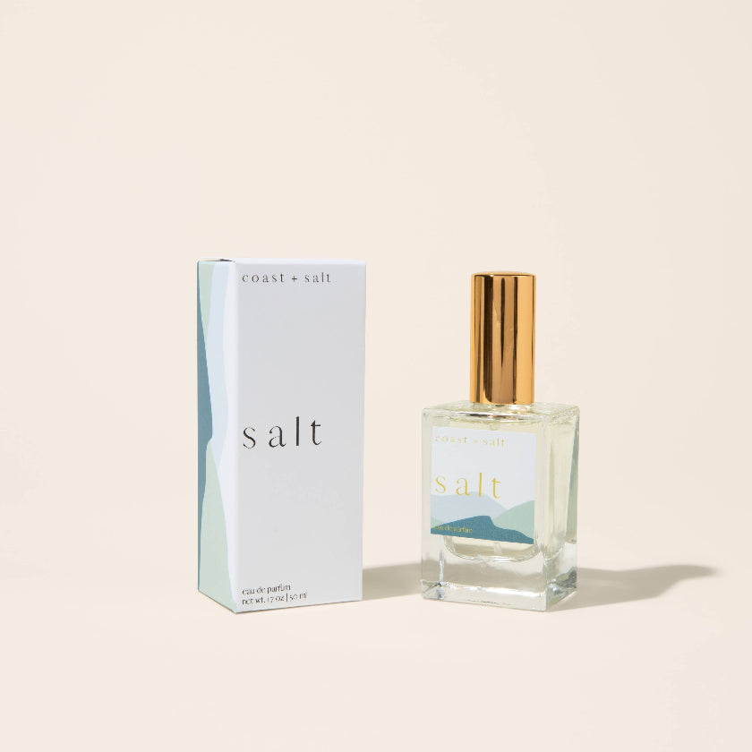 Perfume bottle and packaging labeled 'salt' on a beige background
