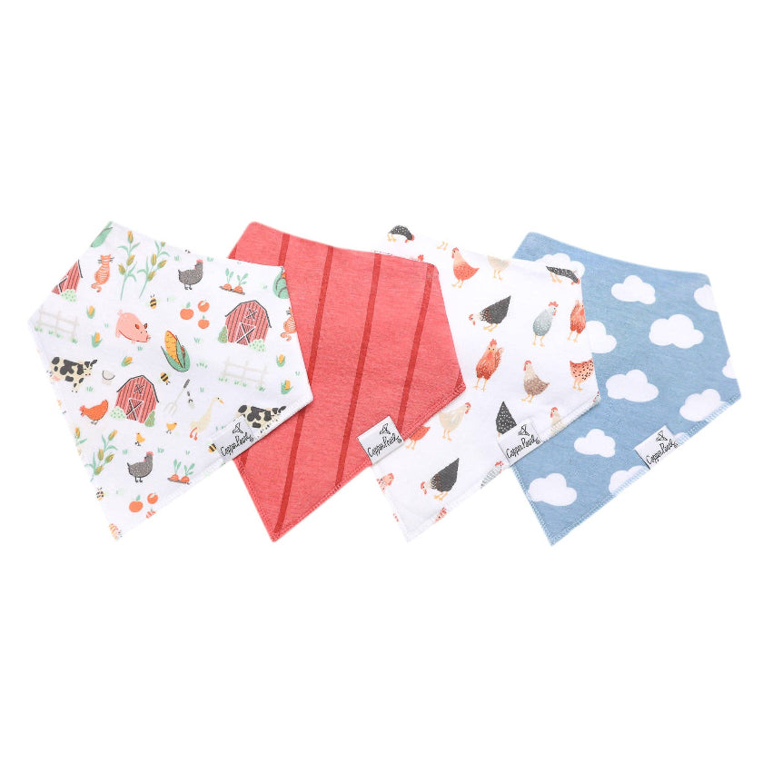 Set of four baby bibs with farm animal and cloud designs on a white background