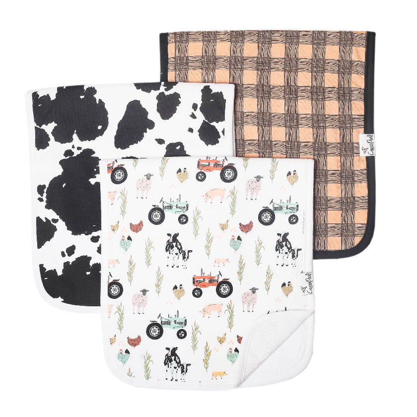 Three baby blankets with different patterns on a white background