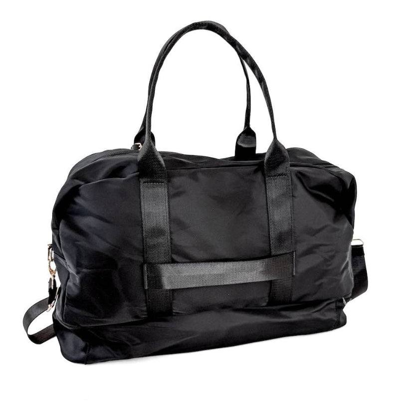 Black duffel bag on a white background
