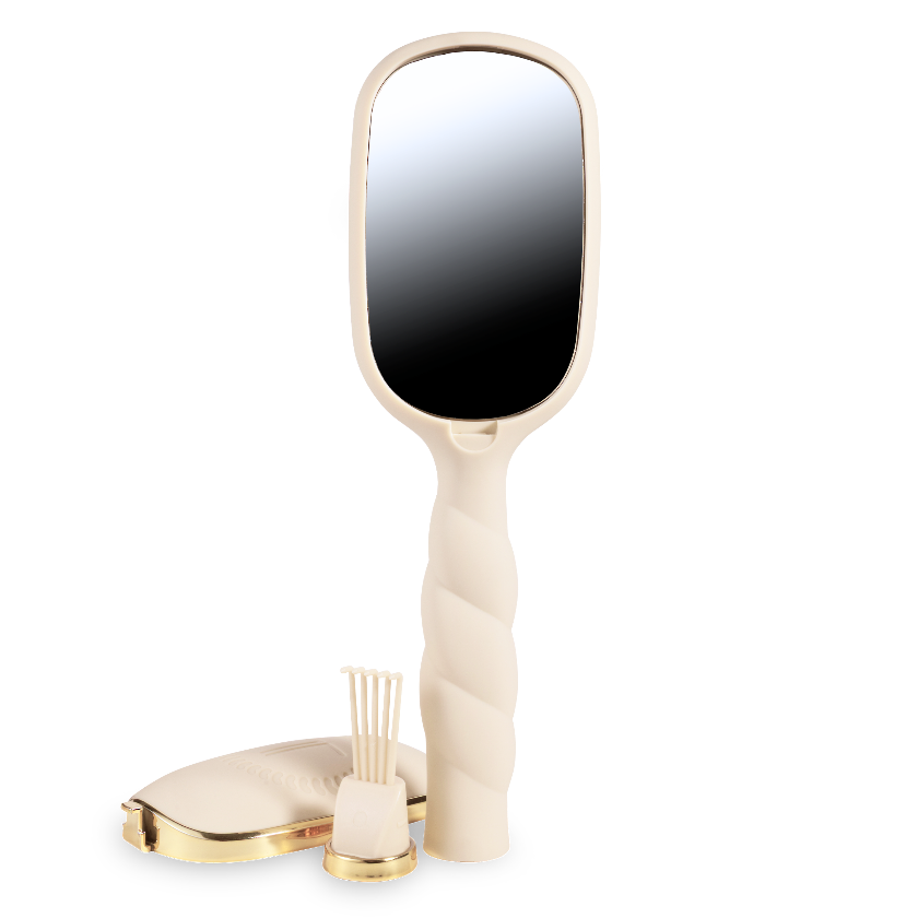 Handheld mirror with a gold and beige handle on a white background
