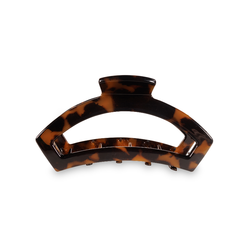Tortoiseshell hair clip on a white background