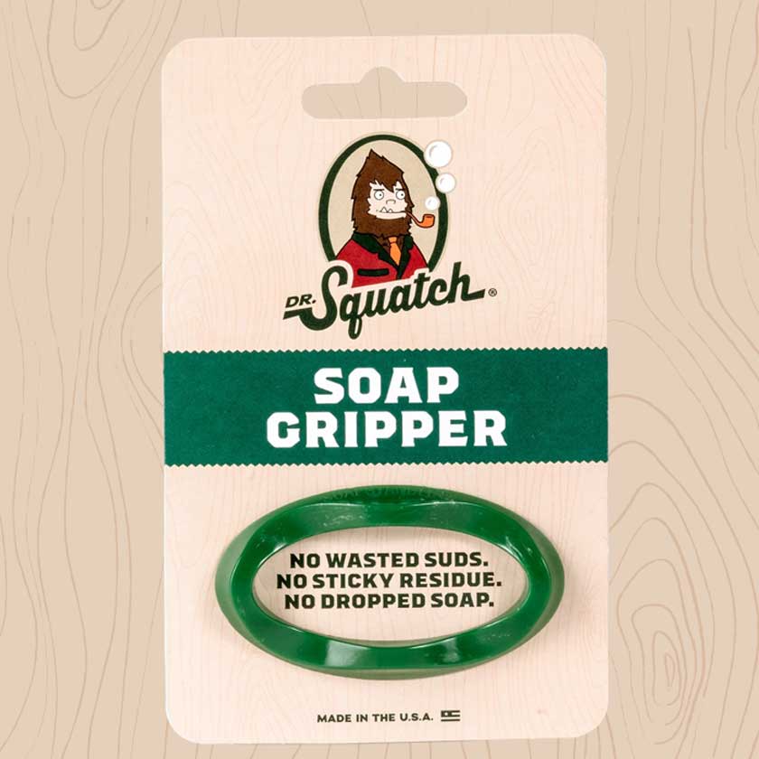 Dr. Squatch's Soap Gripper is an ergonomic soap accessory that attaches to any bar of Dr. Squatch soap to give you a better handle and complete control of your suds.