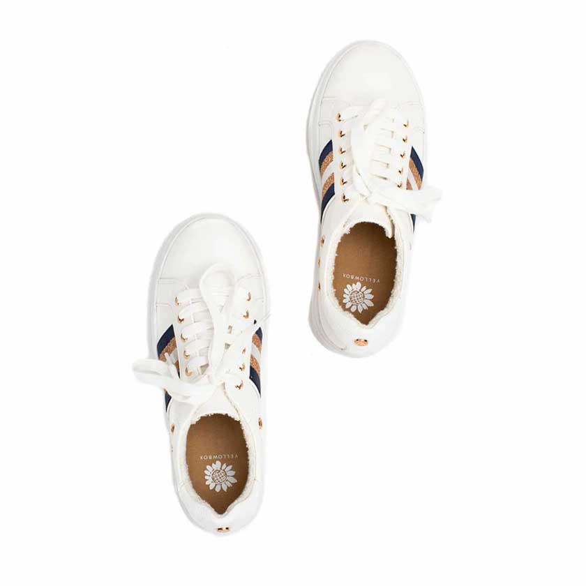 The Emalia sneakers by Yellowbox are the perfect way to add a stylish edge to your every day look. These sleek low-top sneakers are complete with side stripe ribbon detail, metallic hardware, a lace up vamp, padded footbed, and a chunky platform sole.

2" Heel height
1.25" Platform height
Padded removable insole
Faux Leather upper
Rubber outsole