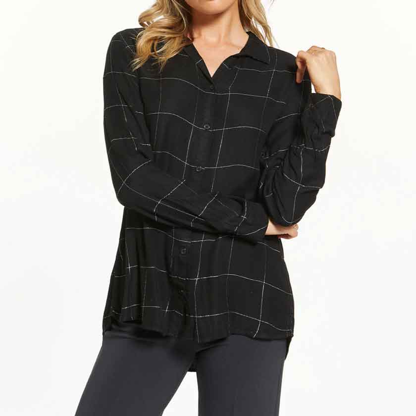 The Helen Top has a collared neckline and button front closure.
