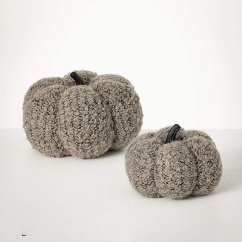 Large pumpkin covered in textured boucle fabric, this decorative pumpkin will look splendid on display from early autumn all the way through Thanksgiving.