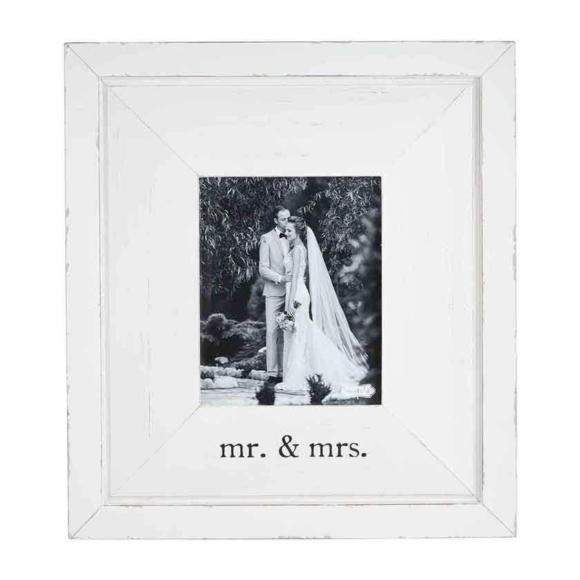 Distressed mitered wood frame stands with easel. Holds 8" x 10" photo.
