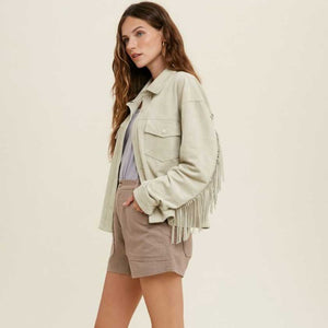 Suede jacket in sand. Fringe detail on the back. Functional buttons and pockets. 90% POLYESTER, 10% SPANDEX