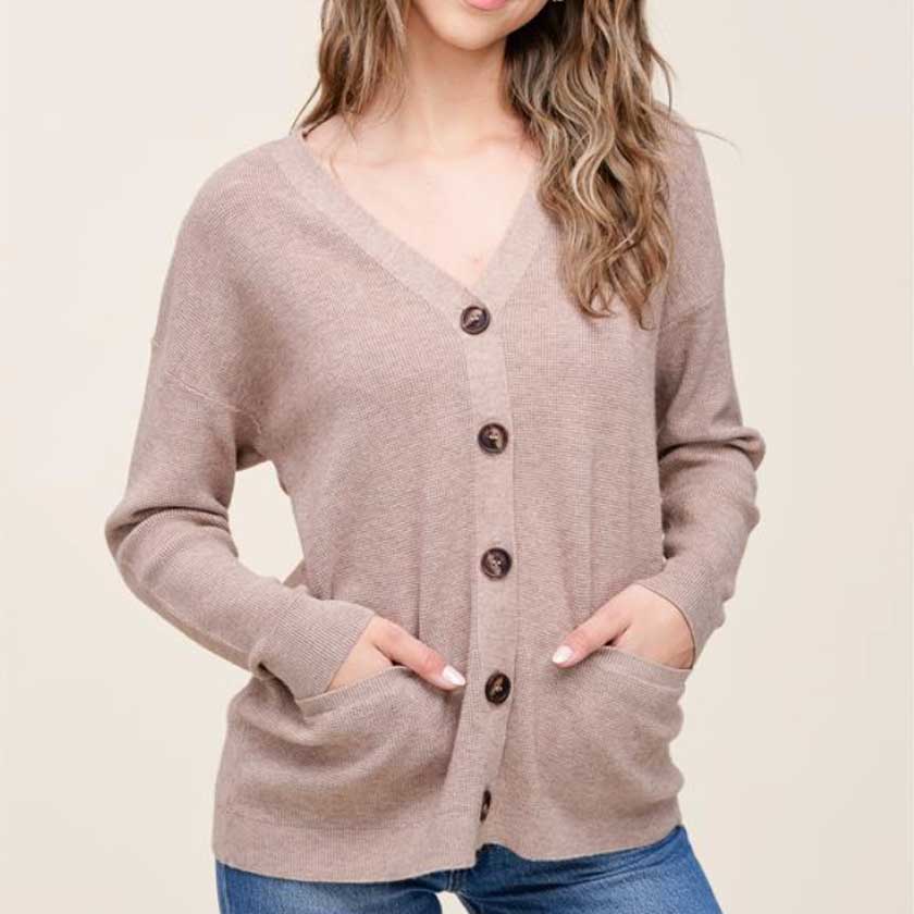V-neck, button down, mini waffle texture cardigan sweater in mocha. Pockets.