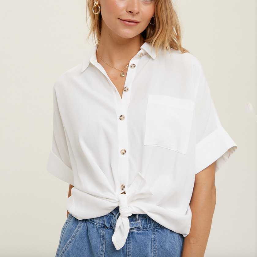 BUTTON UP TOP WITH CUFFED SLEEVE
- FUNCTIONAL BUTTONS AND POCKET